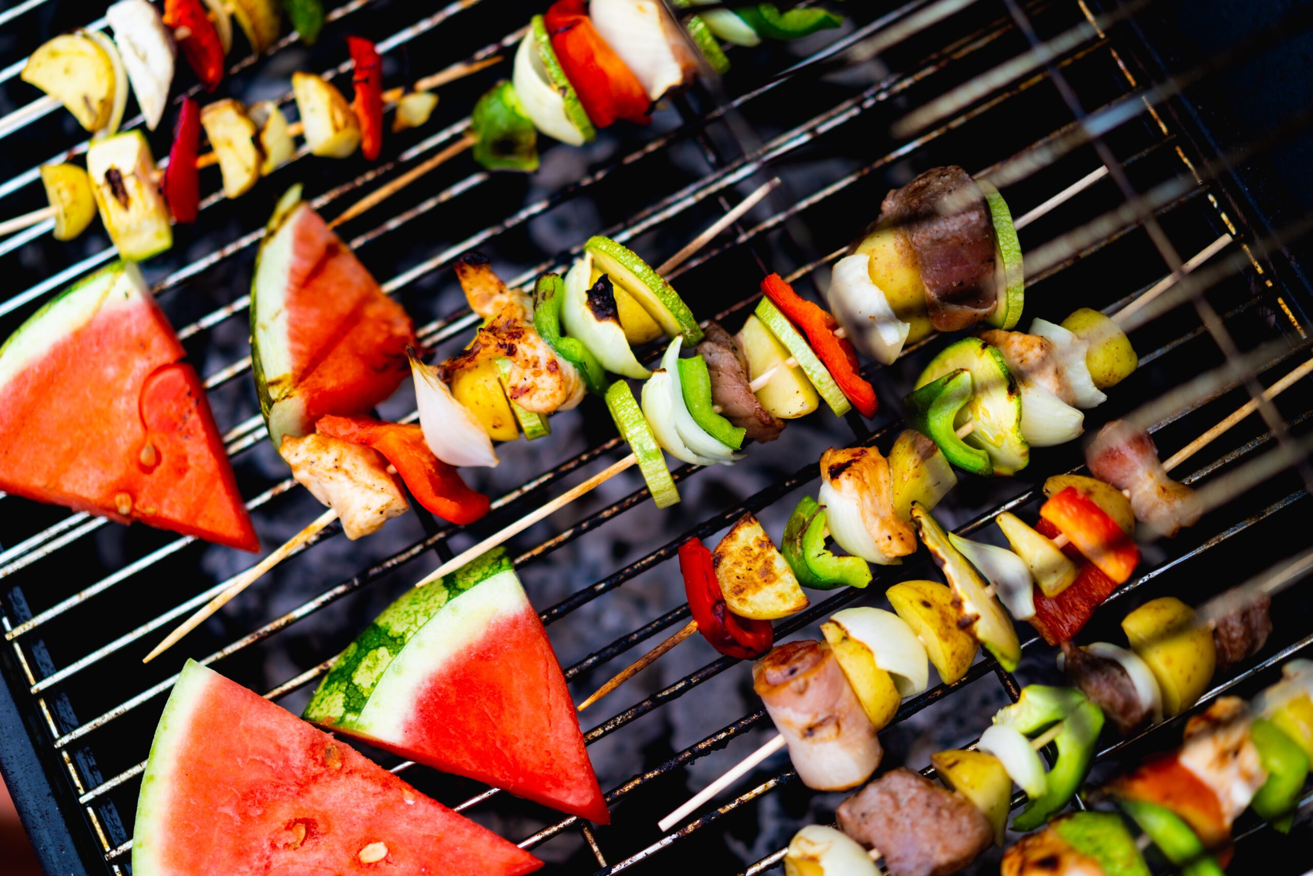 Campervan cooking kebabs on the grill