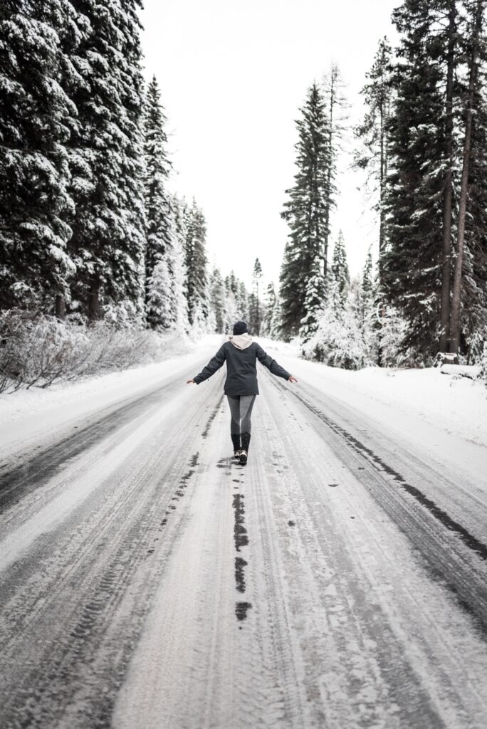 walking-in-a-snowy-forest-road
